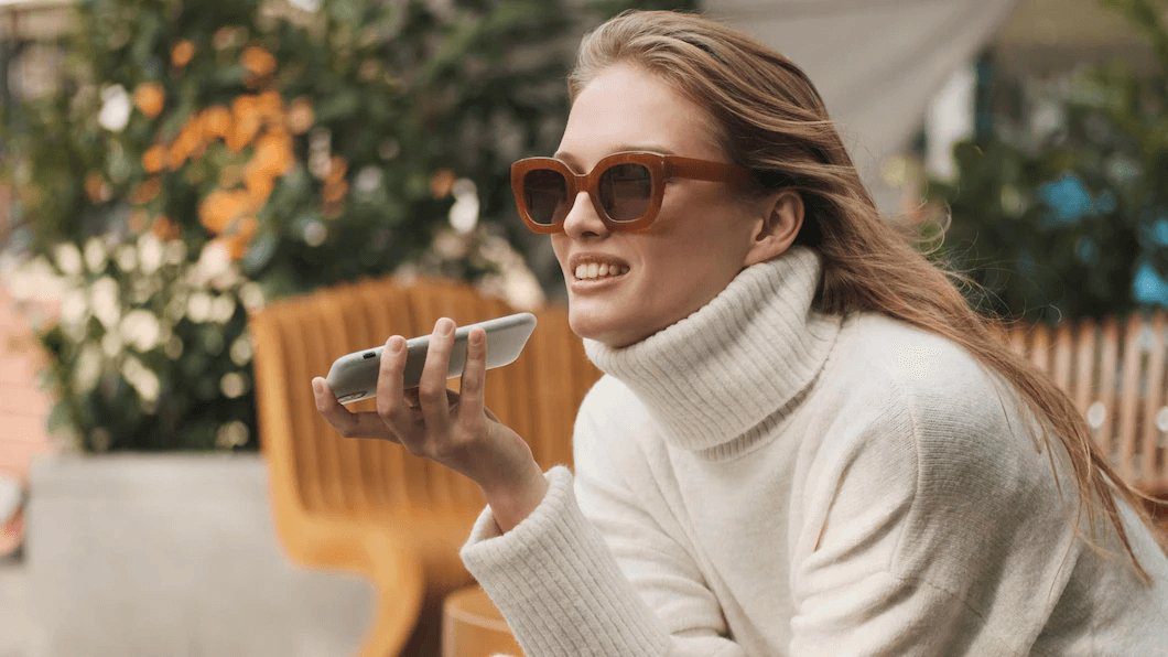 Woman recording a voice memo